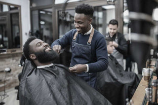 Man shaving in barber shop